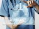 doctors using transparent tablet with hologram medical technology